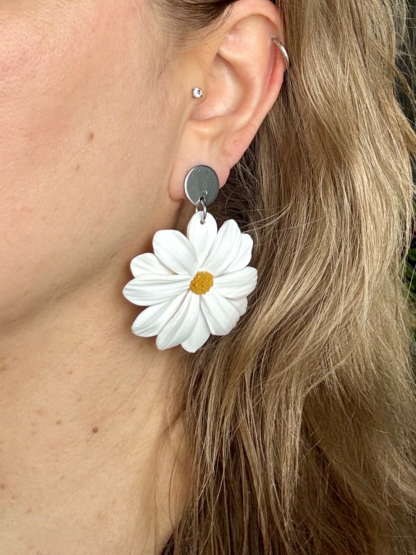 Päivänkakkara -korvakorut