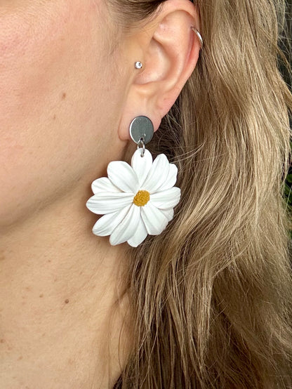 Päivänkakkara -korvakorut