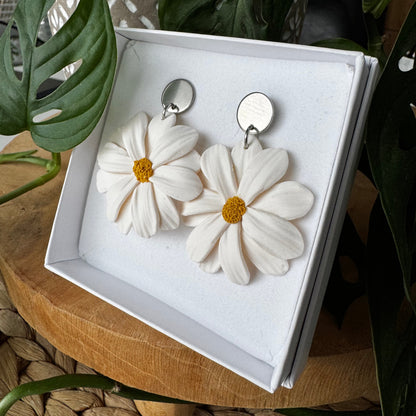 Päivänkakkara -korvakorut