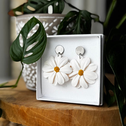 Päivänkakkara -korvakorut